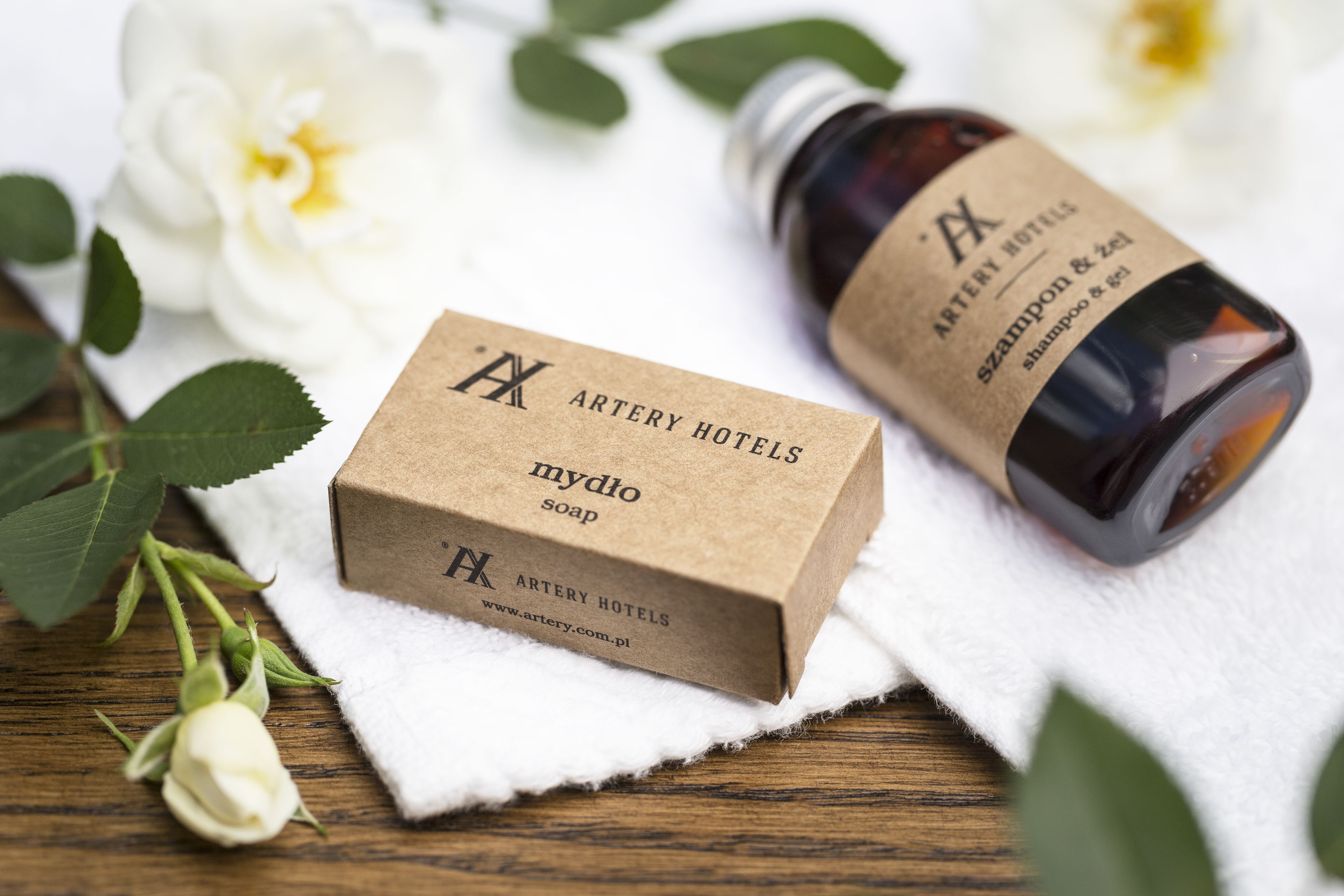 shower, designer toiletries, hair dryer, towels