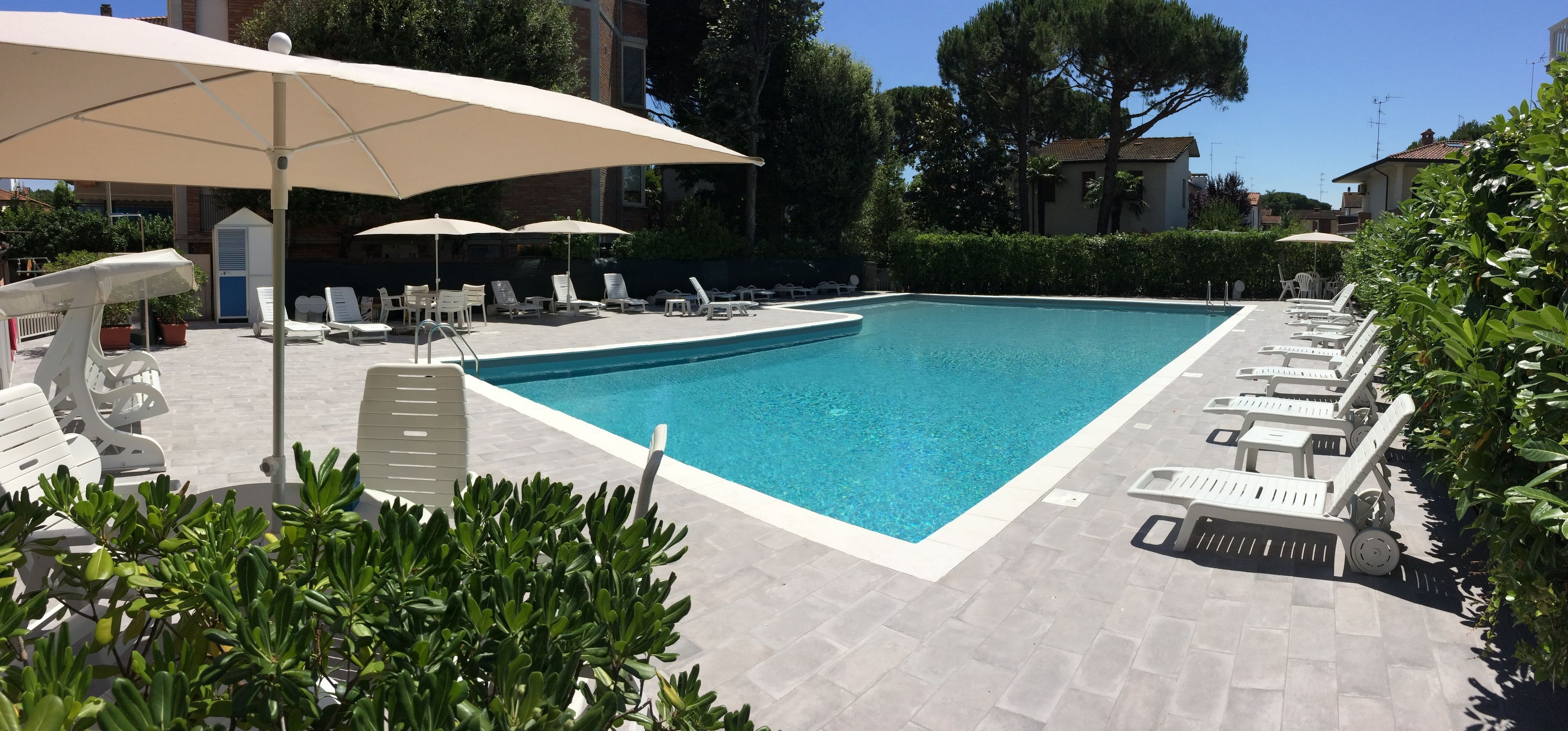 outdoor pool, pool umbrellas, pool loungers