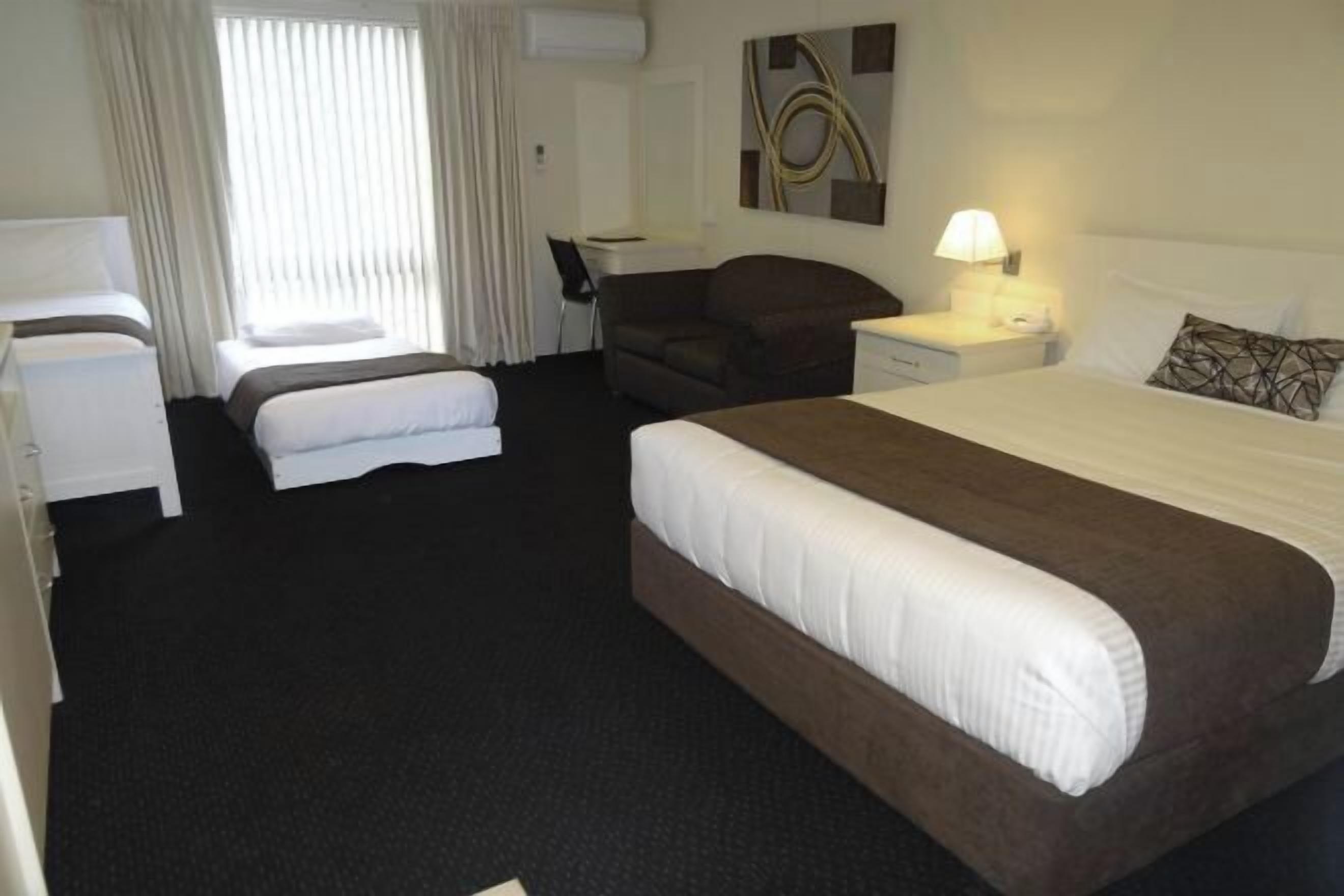 Pillowtop beds, desk, laptop workspace, blackout drapes