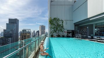 Outdoor pool, open 7:00 AM to 7:00 PM, sun loungers