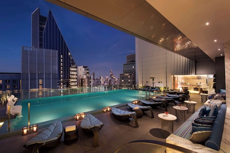 Outdoor pool, open 7:00 AM to 7:00 PM, sun loungers