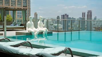 Outdoor pool, open 7:00 AM to 7:00 PM, sun loungers