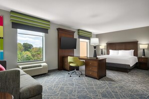 A hotel room with a bed, desk, chair, and a large window. - Hampton Inn & Suites Adairsville-Calhoun Area (Adairsville)