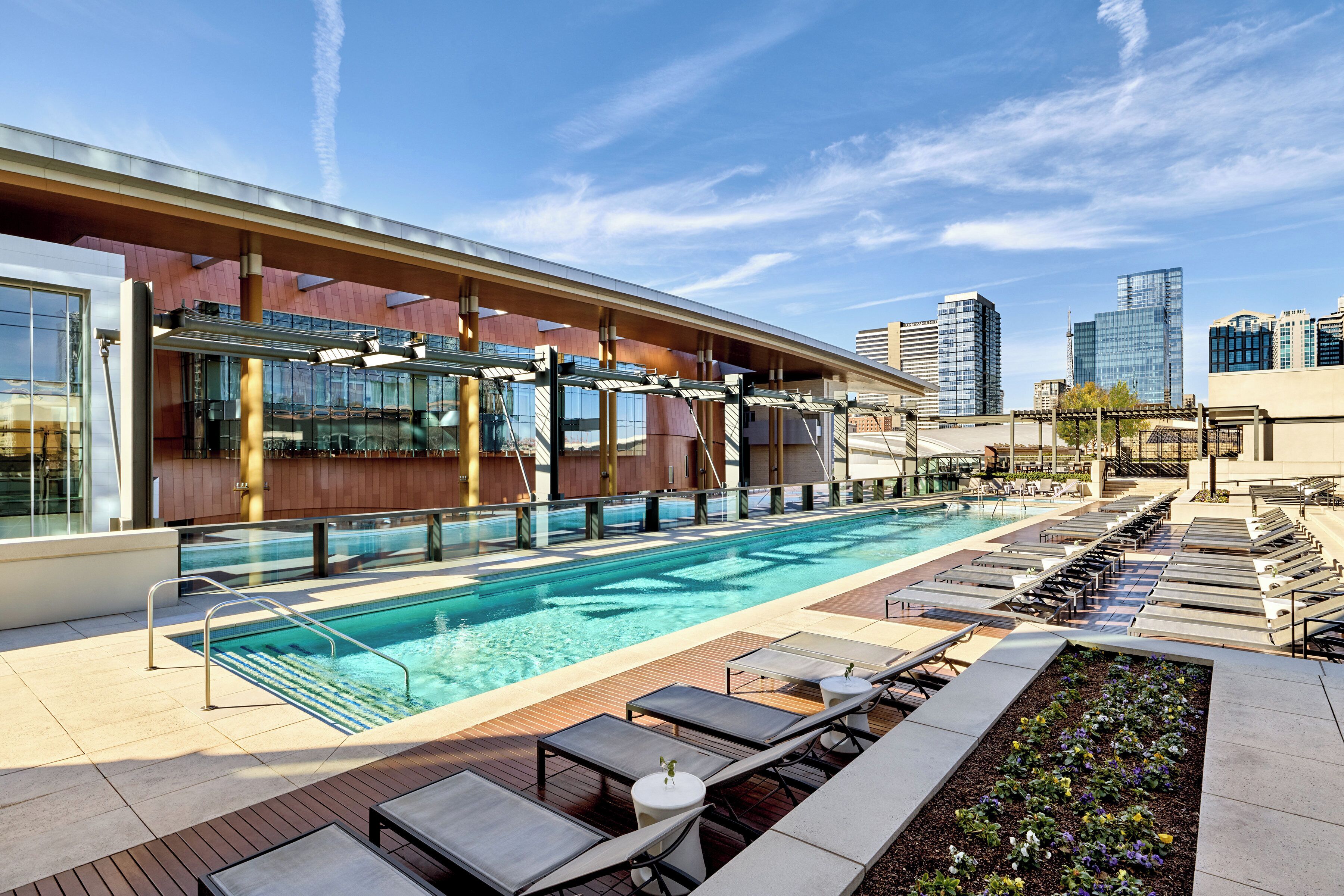 Outdoor pool, open 6:00 AM to 10:00 PM, pool cabanas (surcharge)