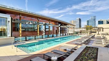 Outdoor pool, open 6:00 AM to 10:00 PM, pool cabanas (surcharge)