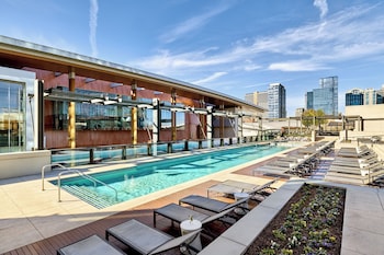 Outdoor pool, open 6:00 AM to 10:00 PM, cabanas (surcharge) at Omni Nashville Hotel