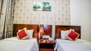 Superior Twin kamer | Een minibar, een kluis op de kamer, een bureau, verduisterende gordijnen