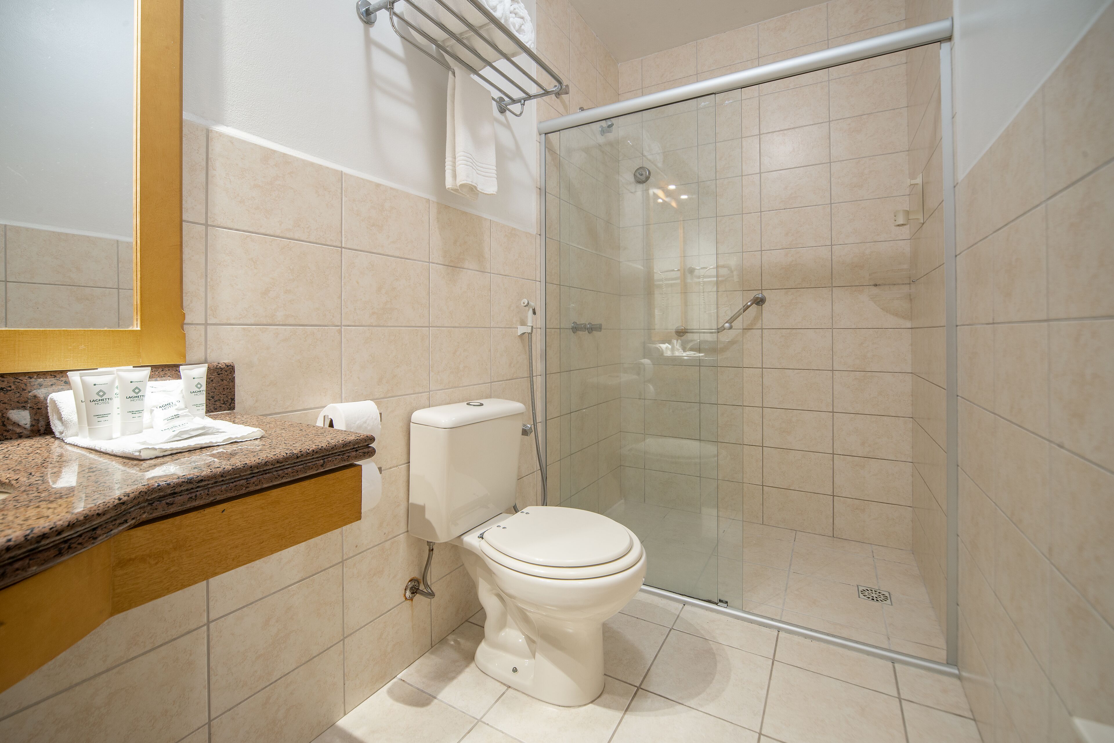 shower, rainfall showerhead, hair dryer, towels