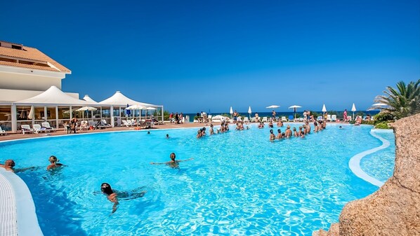 Seasonal outdoor pool, pool umbrellas, sun loungers