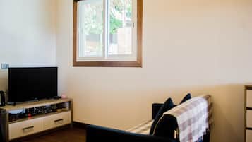 Suite Exécutive, 1 chambre, accessible aux personnes à mobilité réduite, réfrigérateur | Coin séjour | Télévision à écran plat