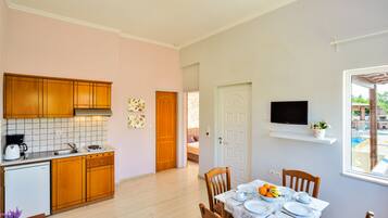 Apartment, 1 Bedroom | Private kitchenette | Fridge, stovetop, coffee/tea maker, electric kettle