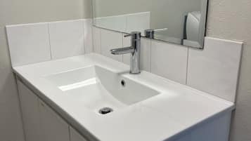 Suite, 2 Bedrooms | Bathroom | Shower, free toiletries, hair dryer, towels