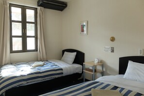 Coffres-forts dans les chambres, draps fournis