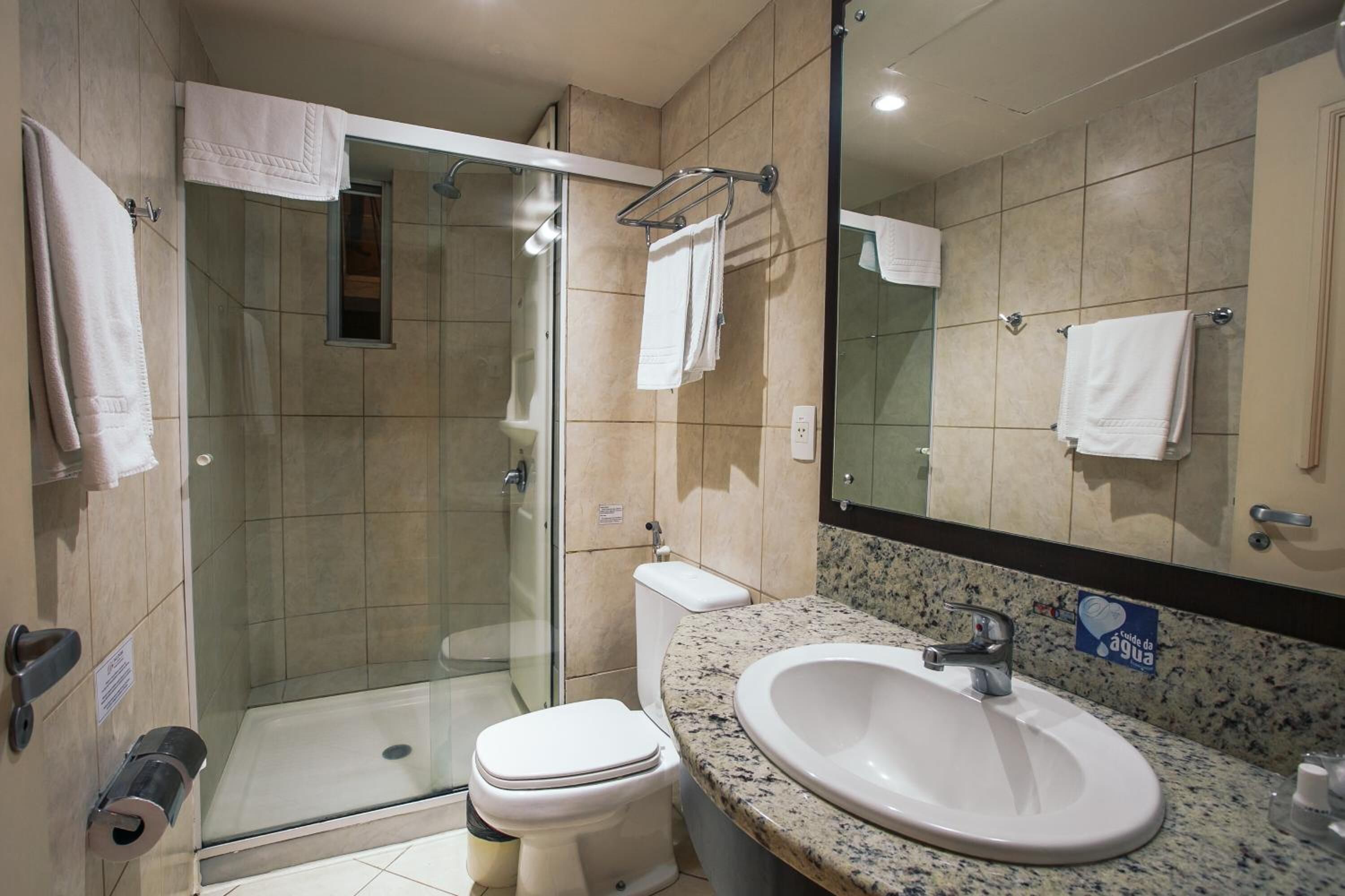 shower, free toiletries, hair dryer, towels