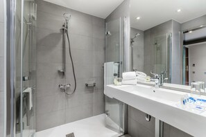 Eco-friendly toiletries, hair dryer, towels