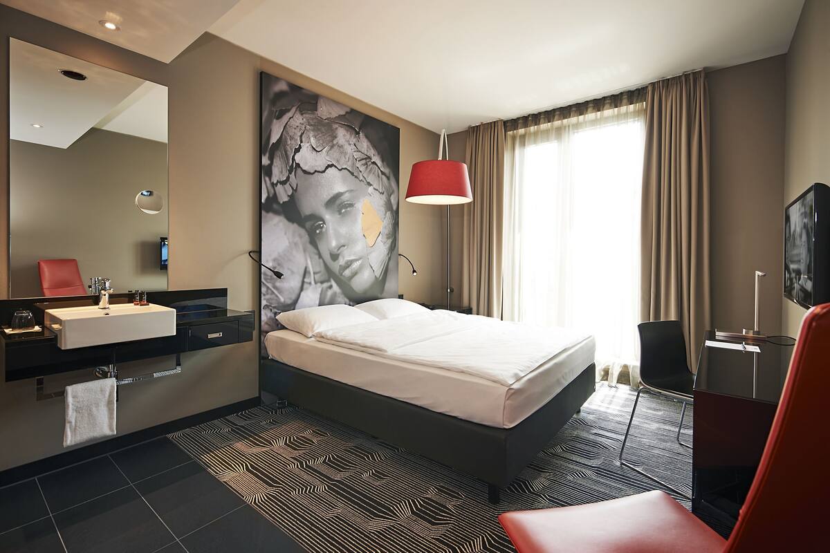 Hypo-allergenic bedding, desk, blackout drapes, iron/ironing board