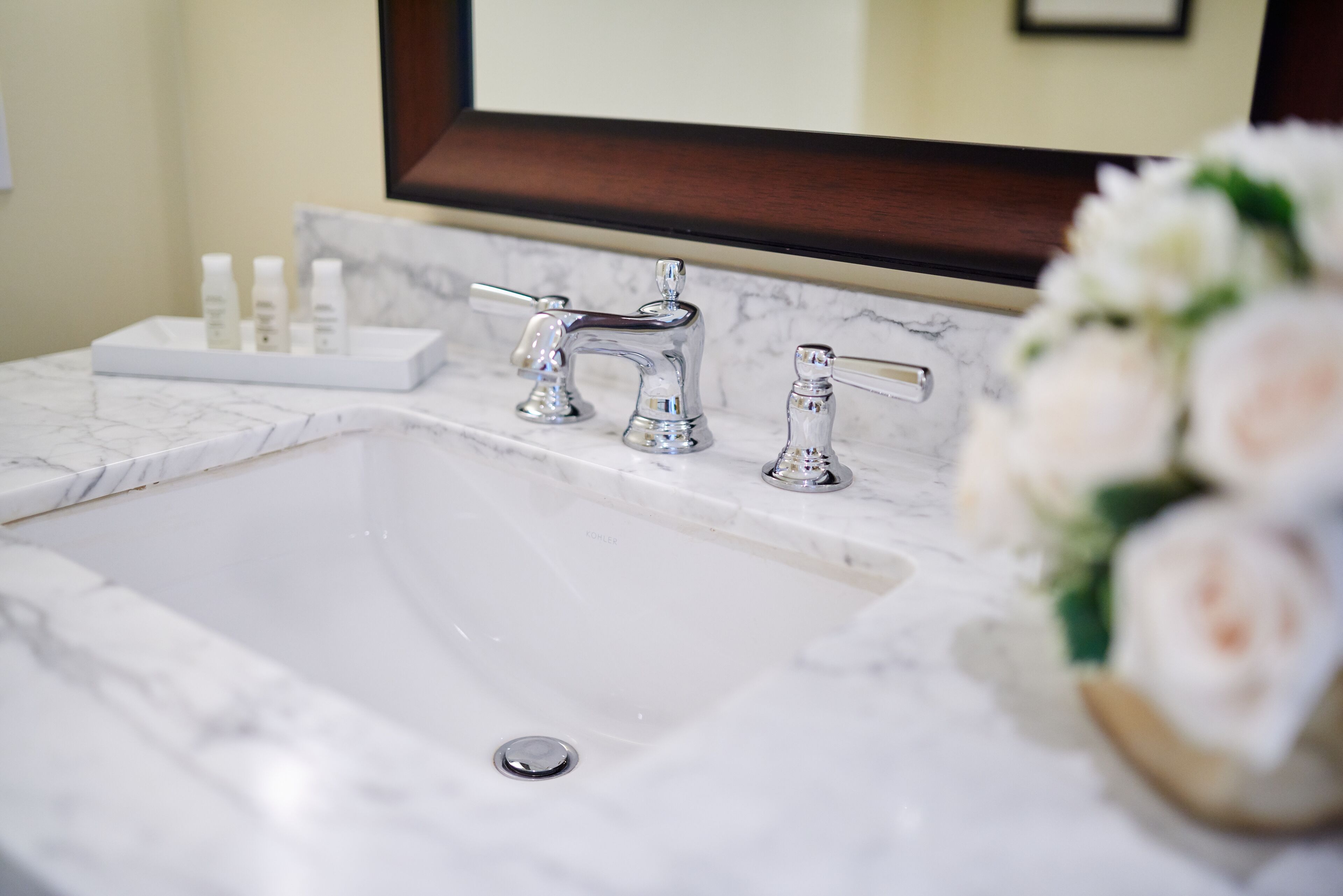 designer toiletries, hair dryer, bathrobes, towels