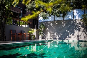 Outdoor pool, open 8:00 AM to 10:00 PM, pool umbrellas, sun loungers