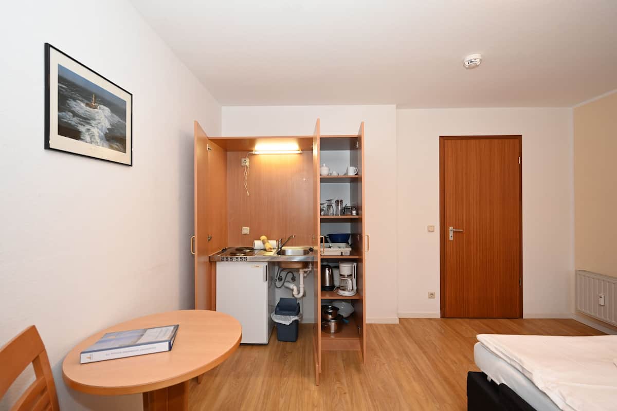 2 slaapkamers, een strijkplank/strijkijzer, babybedden, gratis wifi