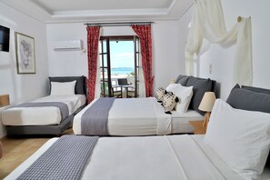 Habitación cuádruple familiar | Ropa de cama hipoalergénica, caja fuerte, tabla de planchar con plancha