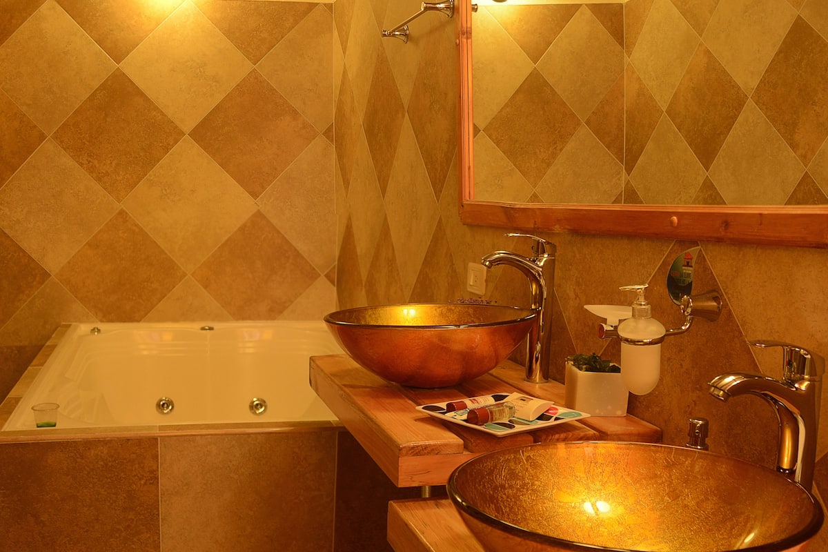 superior suite, jetted tub | bathroom | separate bathtub and shower, jetted bath, hydromassage showerhead