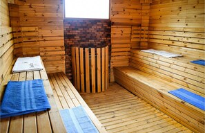 Salas de tratamiento para parejas, sauna y tina de hidromasaje 
