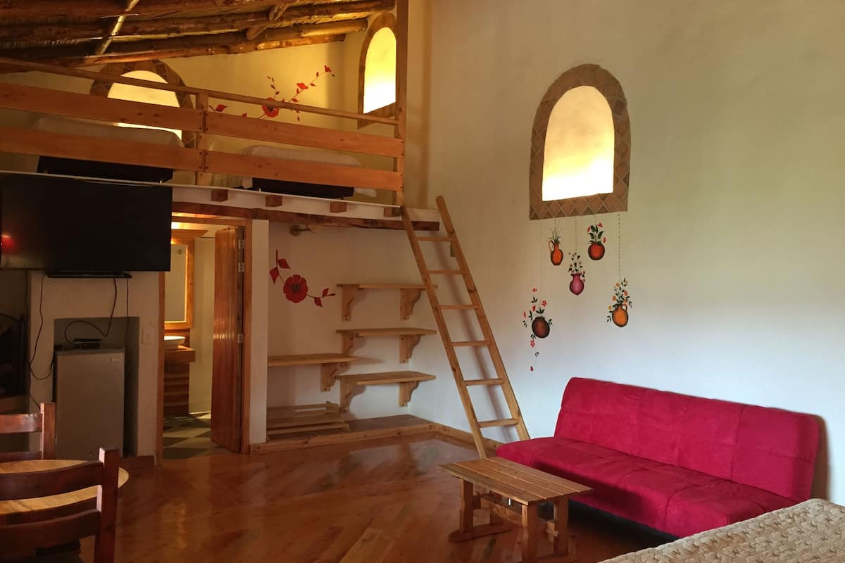 junior suite, fireplace (family) | living area | fireplace