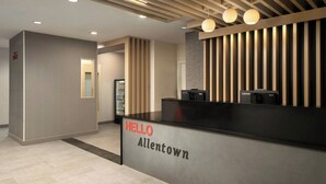 Una recepción con un letrero que dice 'HELLO Allentown'.