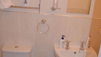 Shower, free toiletries, hair dryer, towels