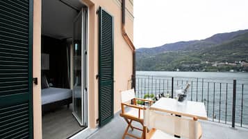 Superior Double Room, Balcony, Lake View | 2 bedrooms, down comforters, minibar, in-room safe