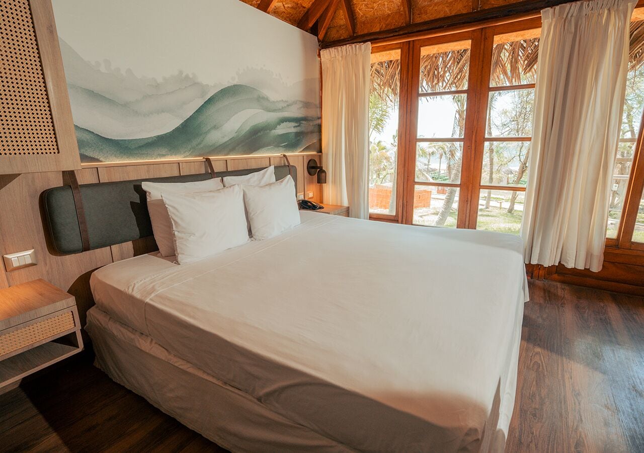 Family Bungalow, Multiple Beds, Garden View | Minibar, in-room safe, free WiFi, bed sheets