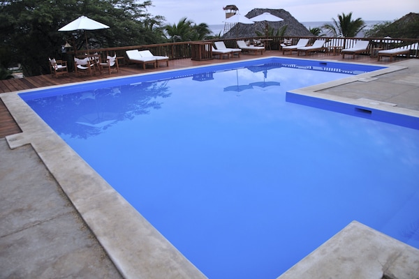 Outdoor pool, pool umbrellas, pool loungers