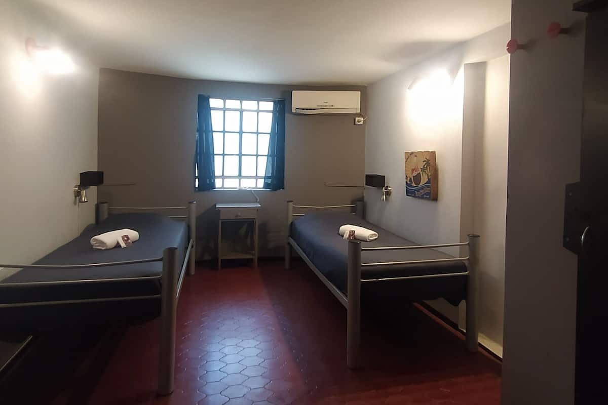 Economy Twin Room, 2 Twin Beds, Shared Bathroom | In-room safe, free WiFi