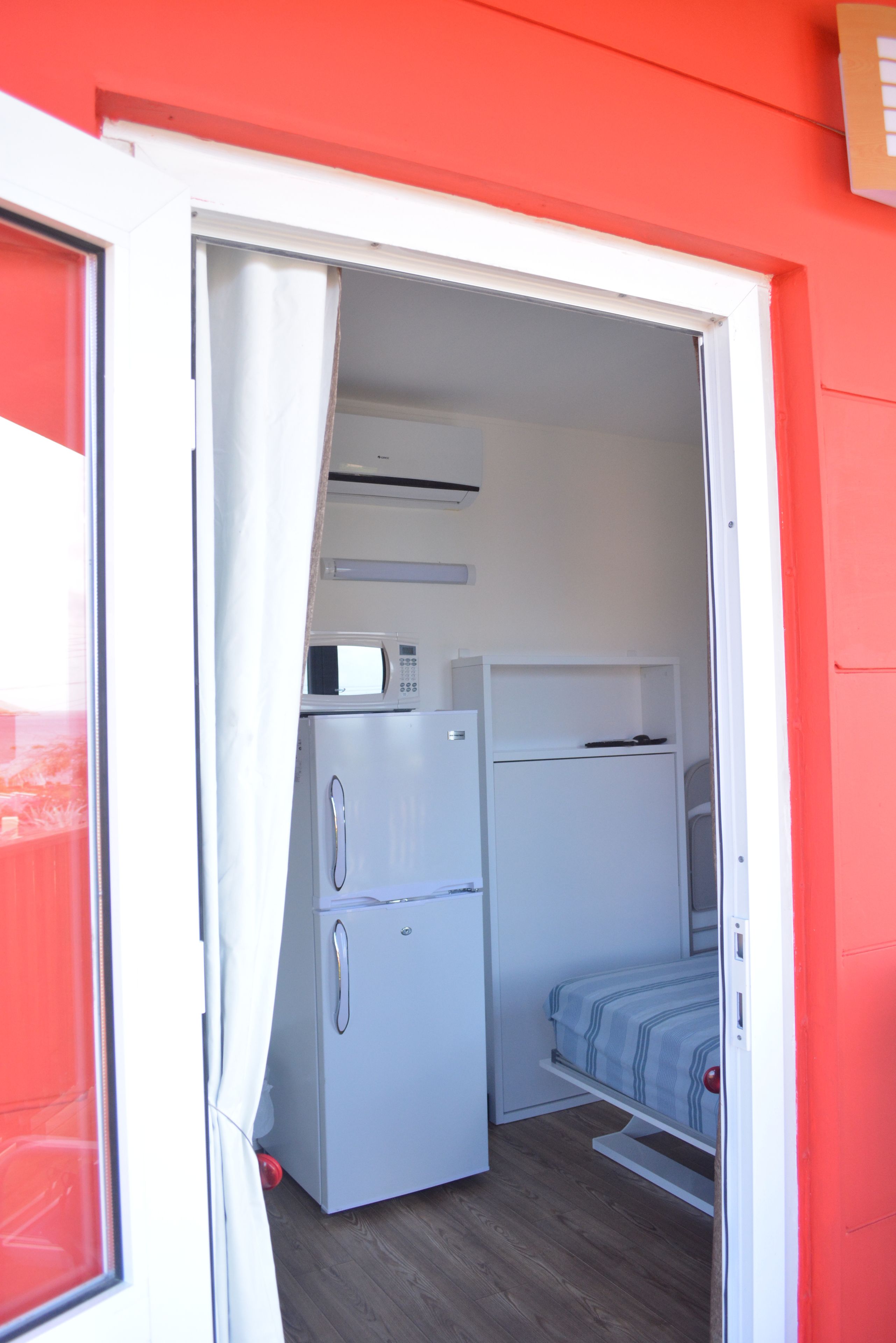 design studio, 1 queen bed, pool view, poolside | 1 bedroom, in-room safe, individually decorated, individually furnished