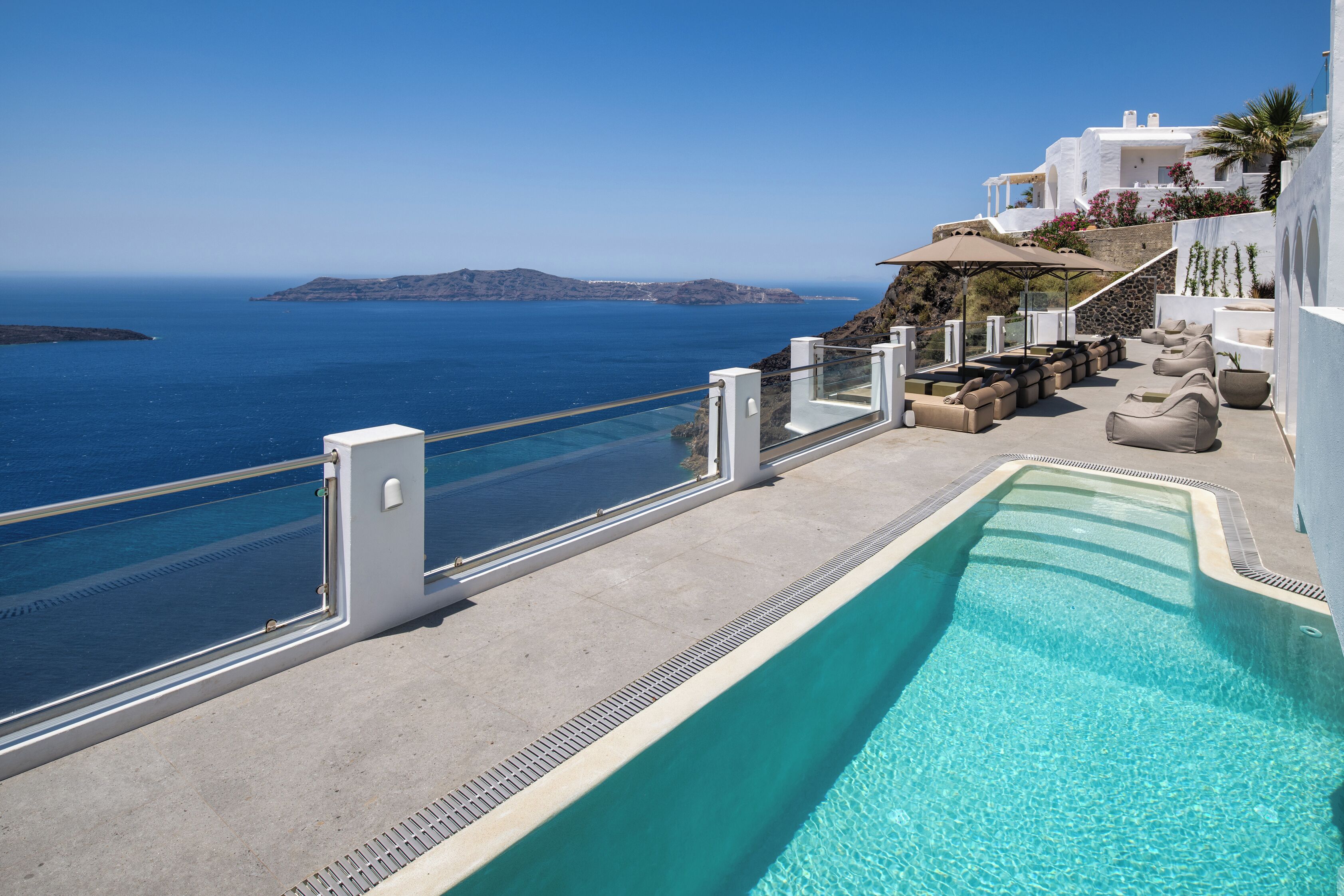 Outdoor pool, open 9:30 AM to 8:30 PM, pool umbrellas, pool loungers