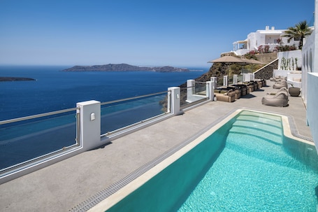 Outdoor pool, open 9:30 AM to 8:30 PM, pool umbrellas, sun loungers. Ira Hotel & Spa - Adults Only