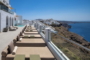 Outdoor pool, open 9:30 AM to 8:30 PM, pool umbrellas, pool loungers
