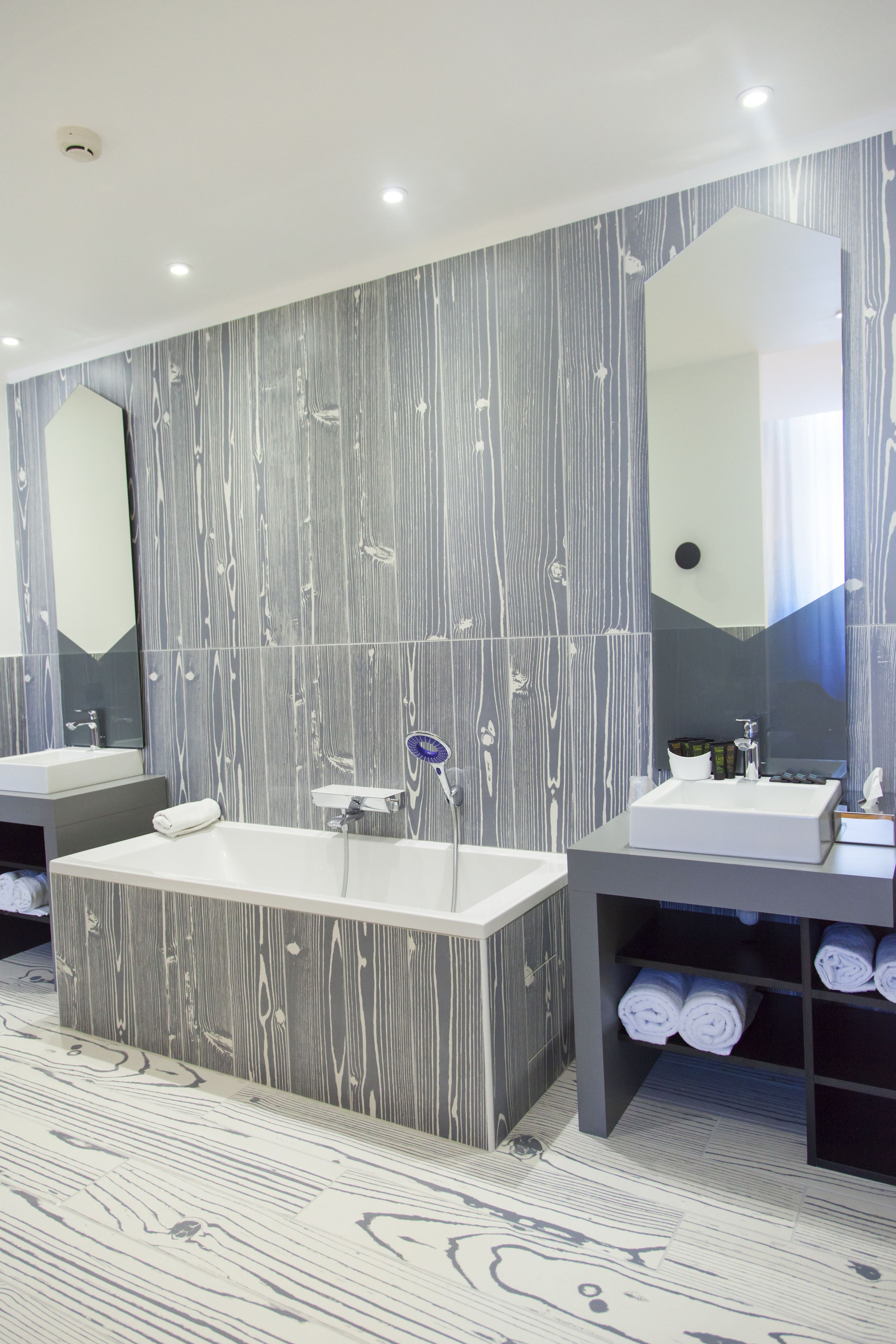 mini suite | bathroom | designer toiletries, hair dryer, towels