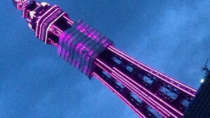 A tower with a pointed top and a series of horizontal beams. - Wilsons Hotel - Blackpool Tower View (Blackpool)