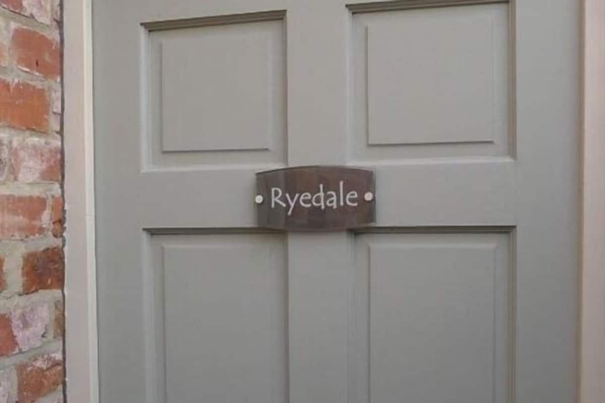 A door with a nameplate reading "Ryedale."
