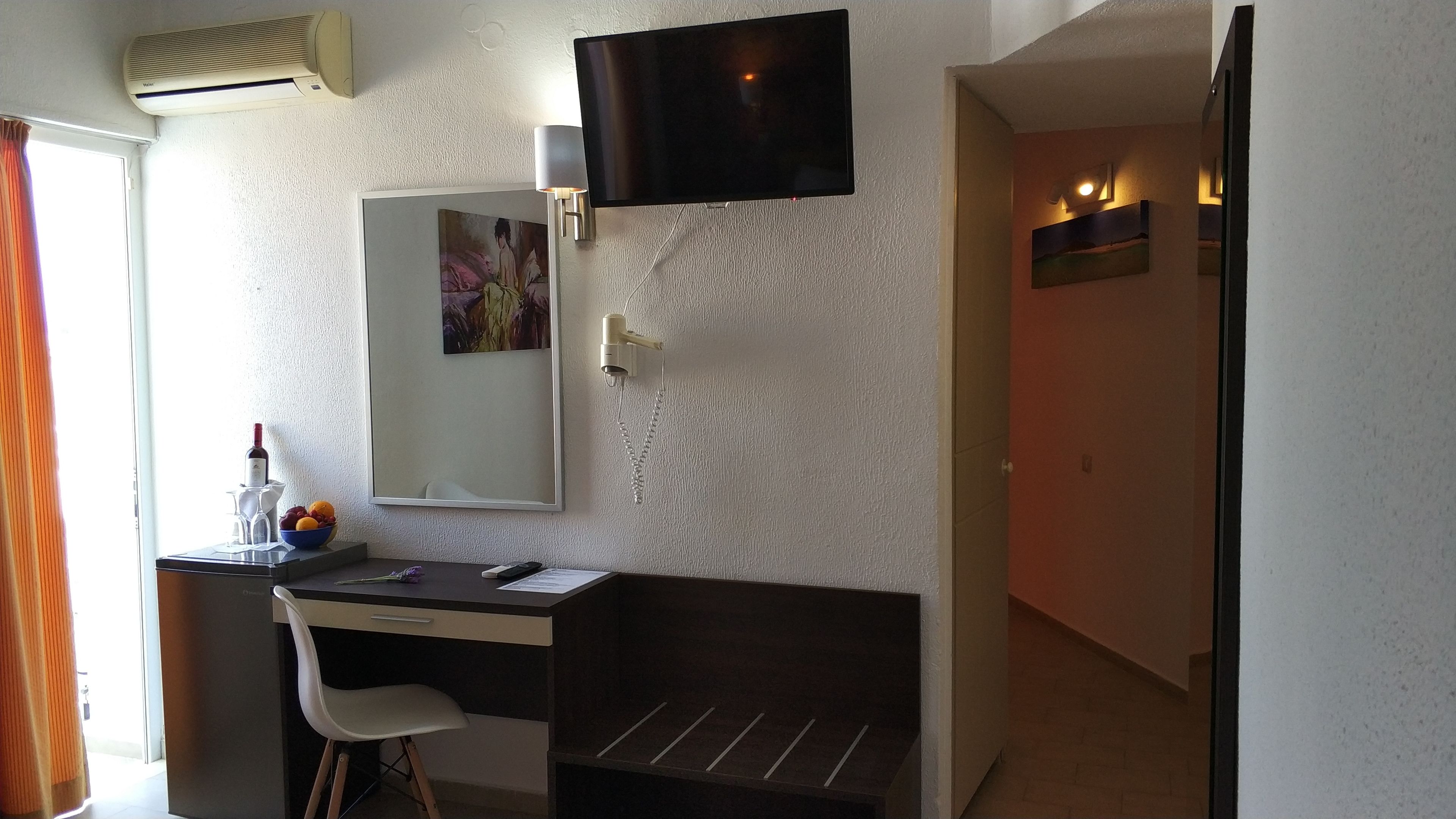 superior room, courtyard view | living area | flat-screen tv