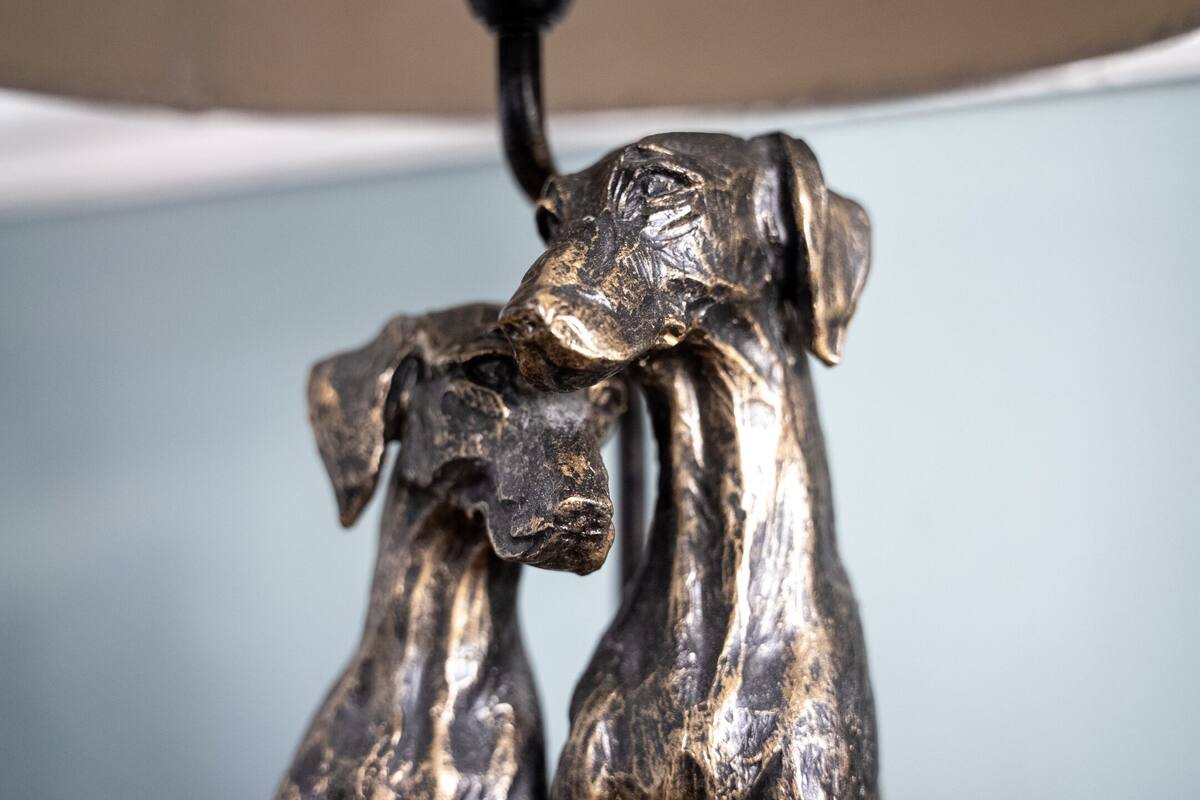 A sculpture of two dogs.