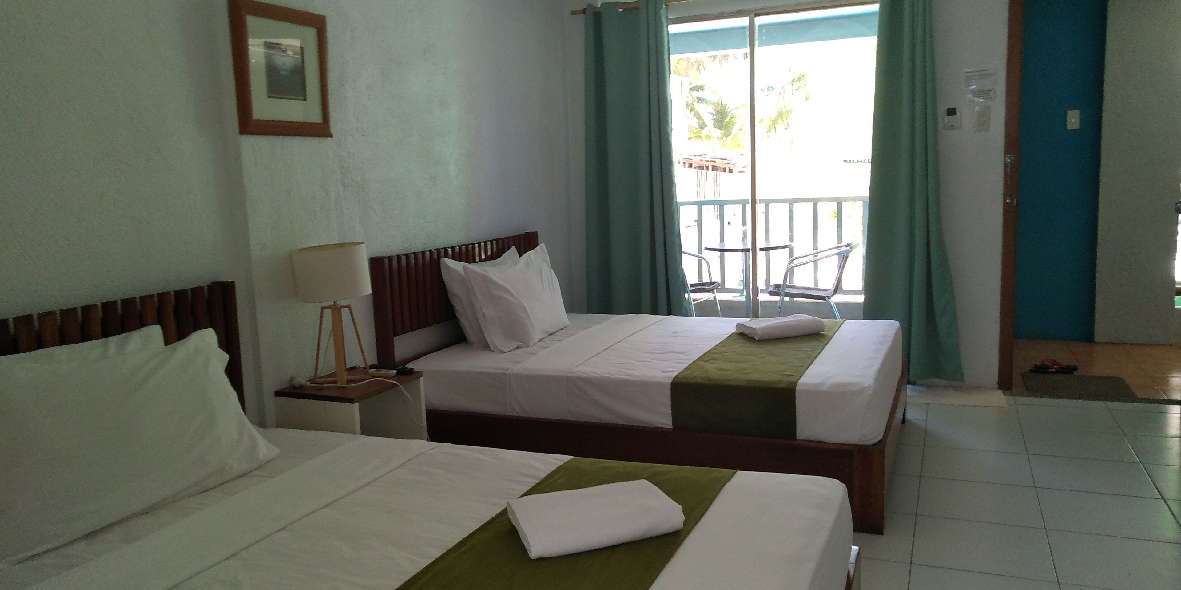 deluxe twin room | in-room safe, iron/ironing board, free wifi, bed sheets
