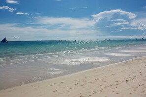 On the beach, white sand, beach towels - MR Holidays Hotel (Boracay Island)