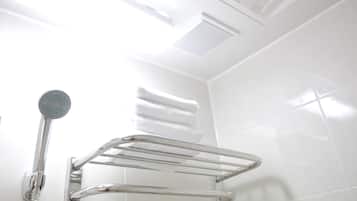 Shower, free toiletries, hair dryer, slippers