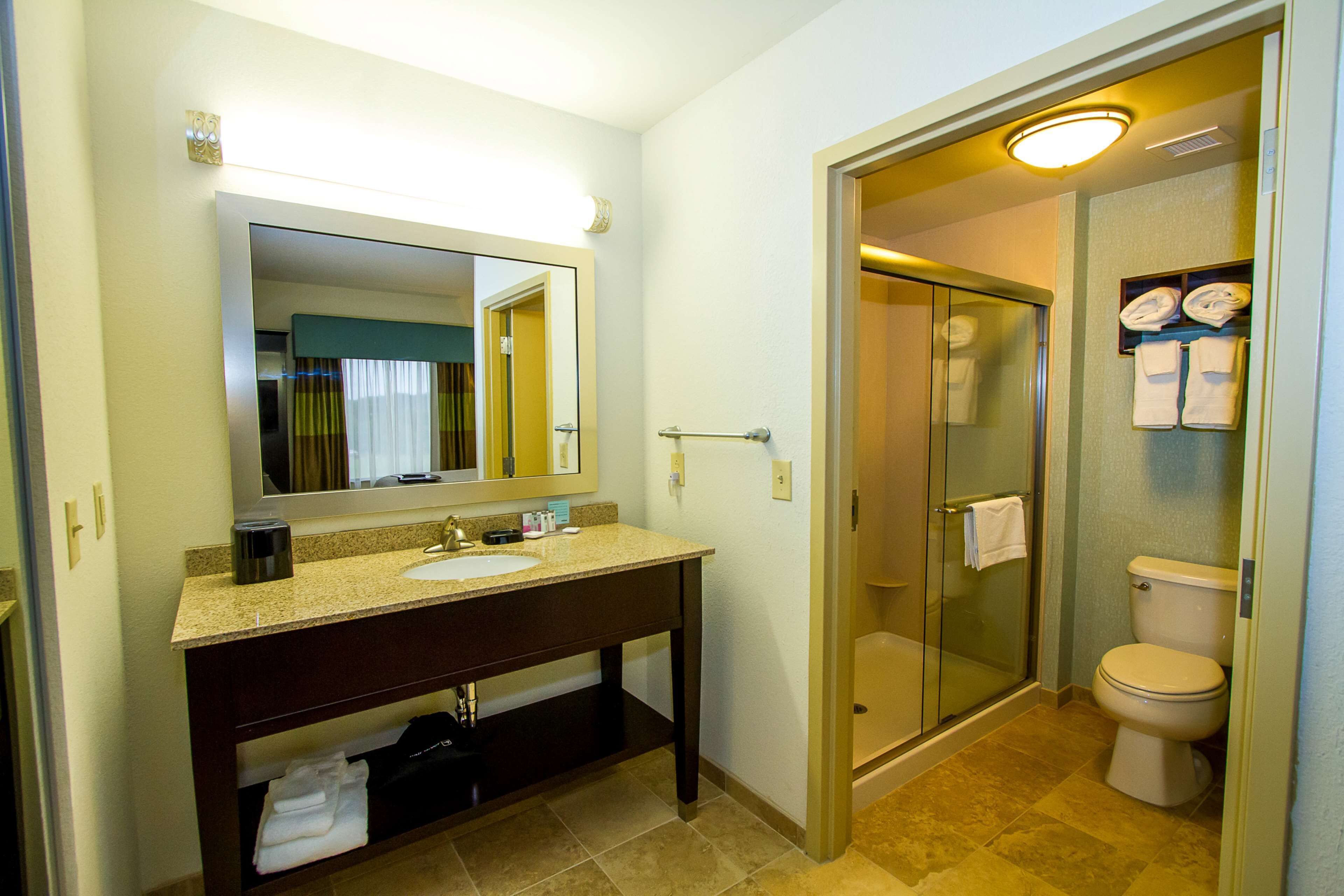 studio, one king bed | bathroom | free toiletries, hair dryer, towels, soap