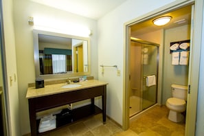 Studio, One King Bed | Bathroom | Free toiletries, hair dryer, towels, soap