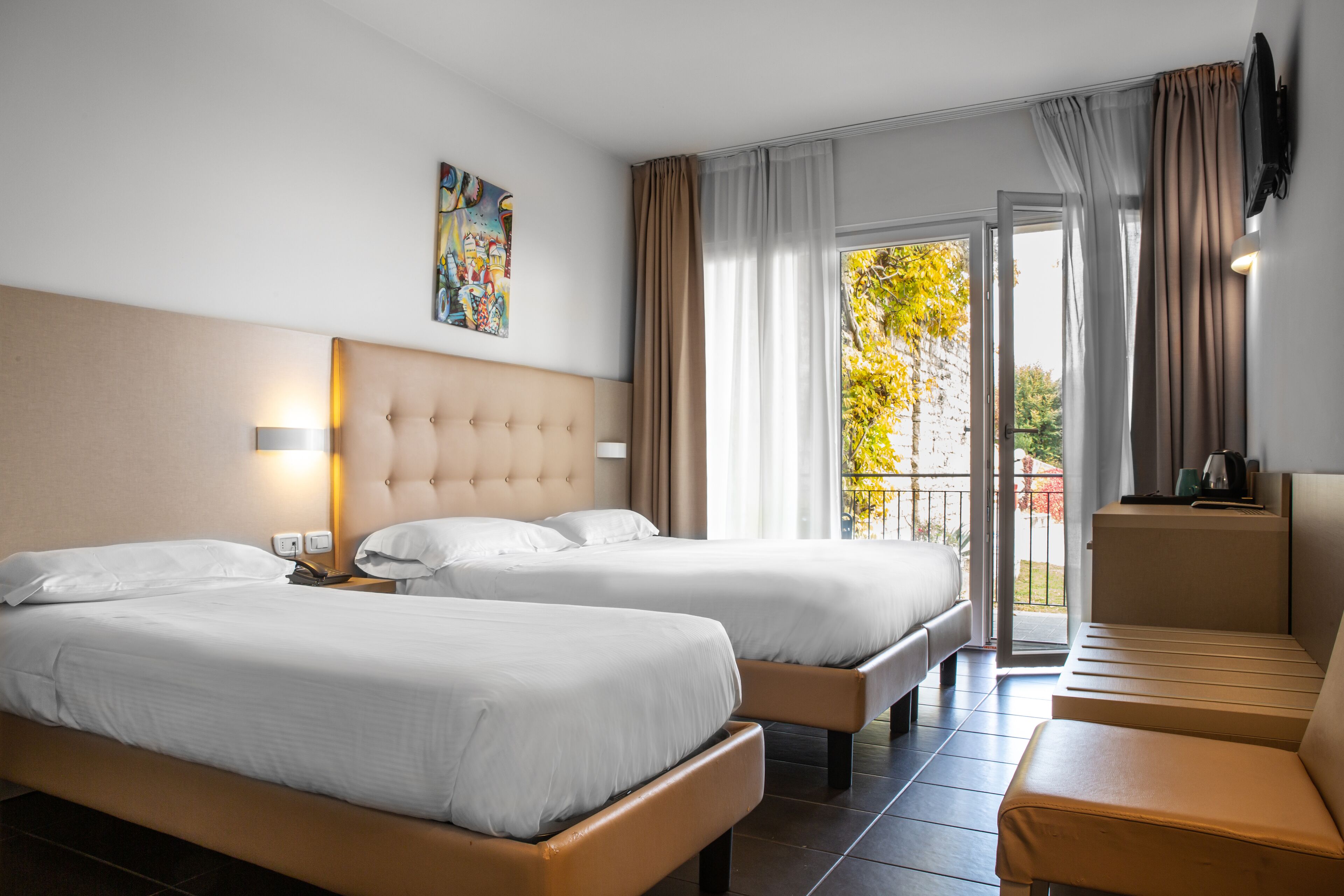 standard triple room, lake view | 1 bedroom, in-room safe, desk, free wifi