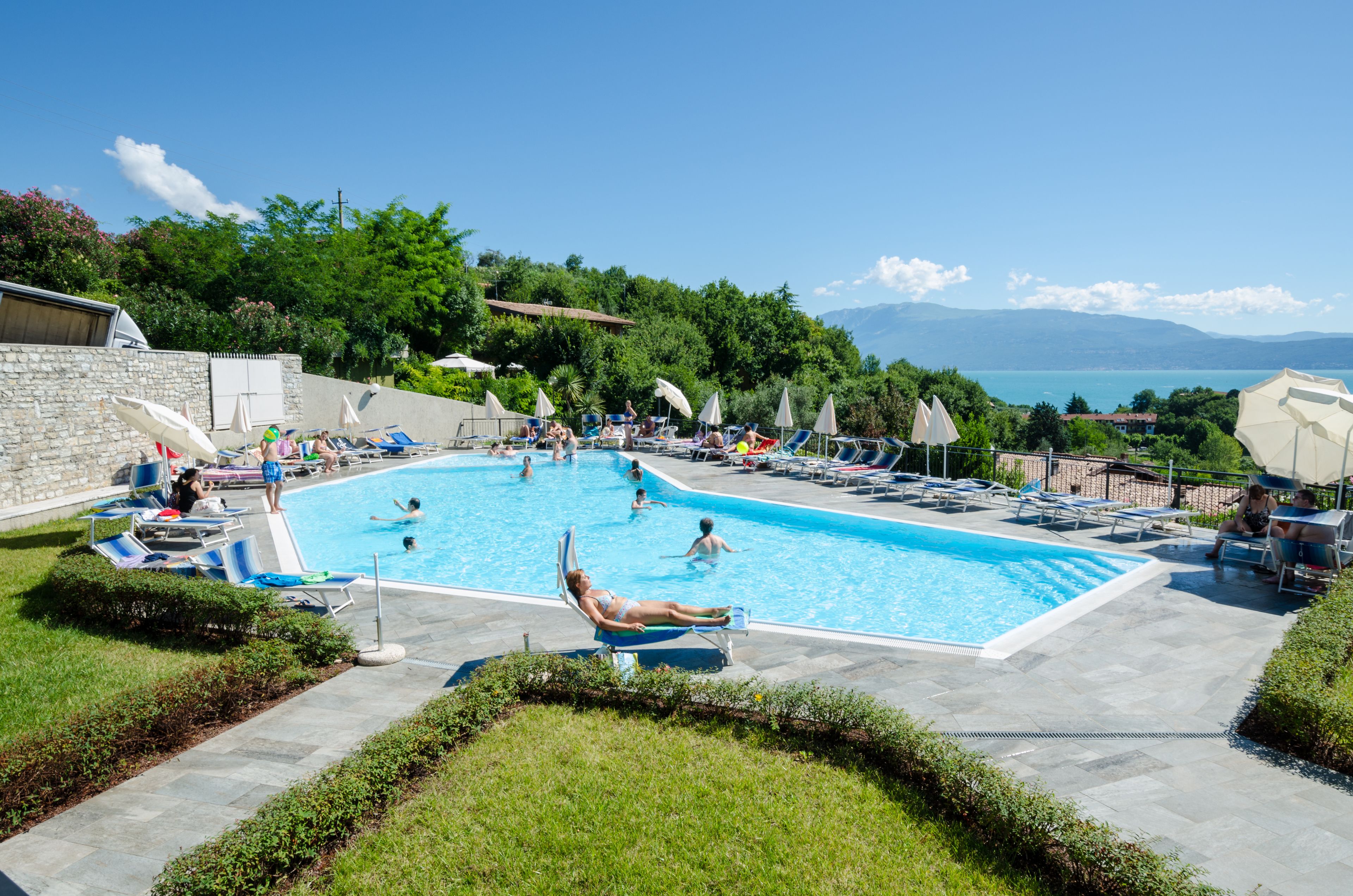 Outdoor pool, pool umbrellas, sun loungers