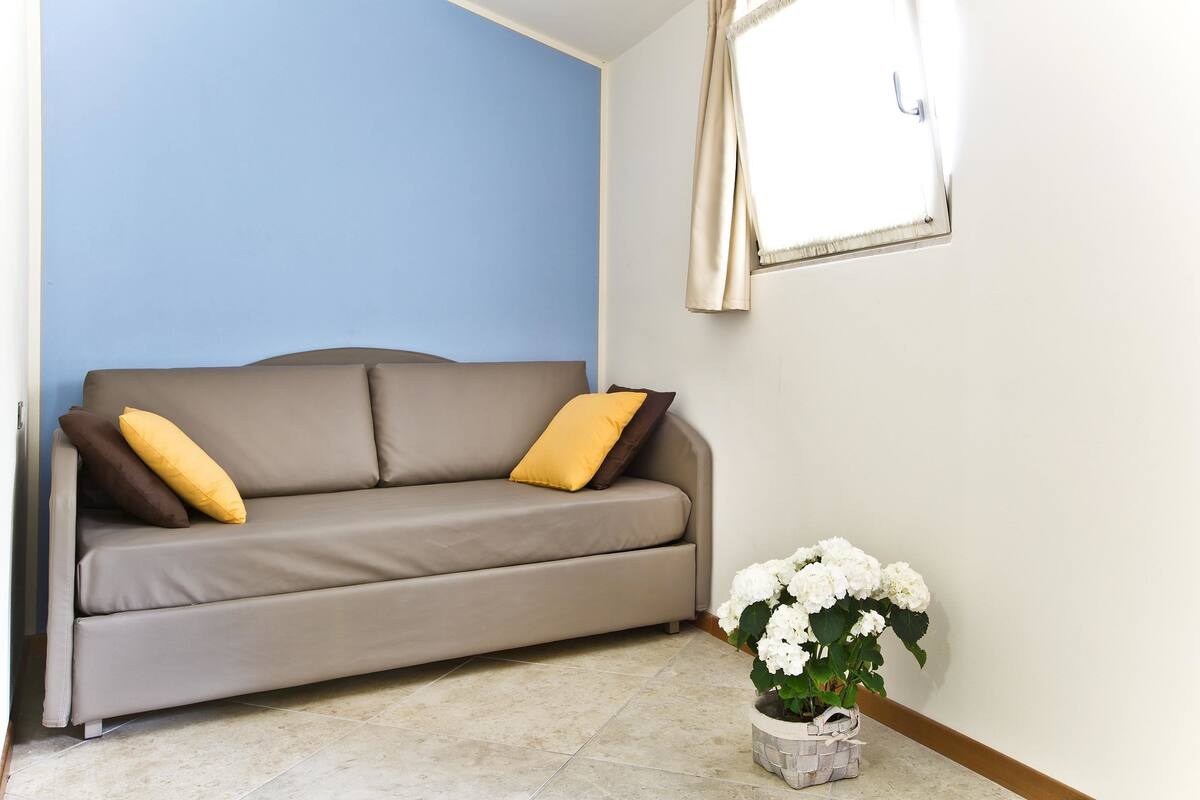 superior triple room, lake view | 1 bedroom, in-room safe, desk, free wifi